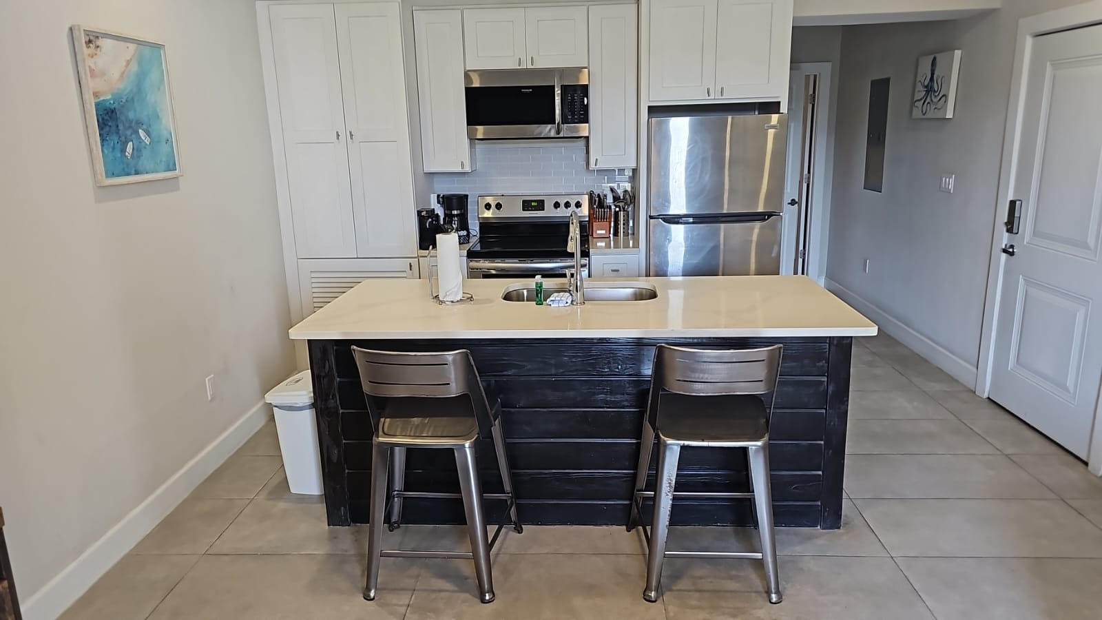 Pool view with den kitchen