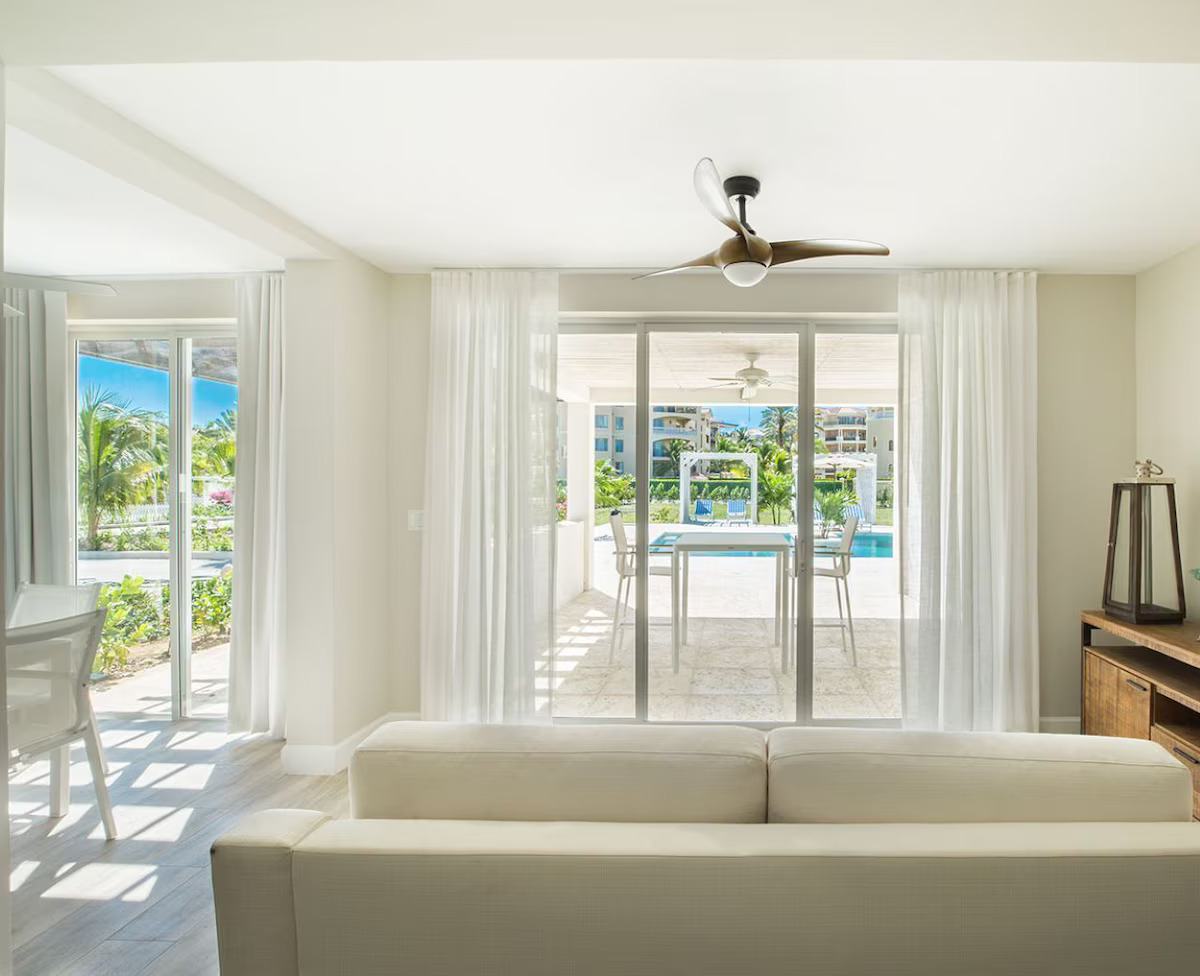 Pool View Suites at The Tides Grace Bay - Serene suites overlooking the resort pool with modern amenities and comfortable furnishings, perfect